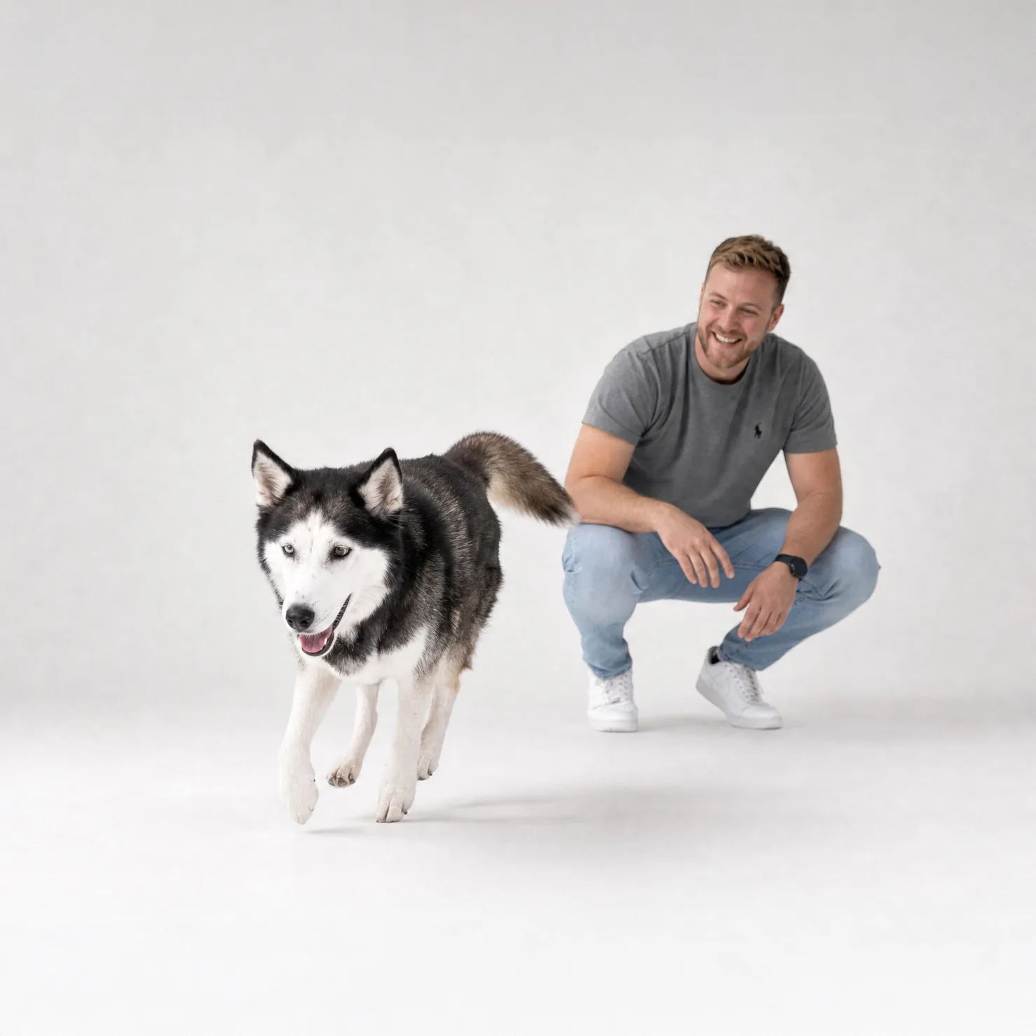Mann mit Husky